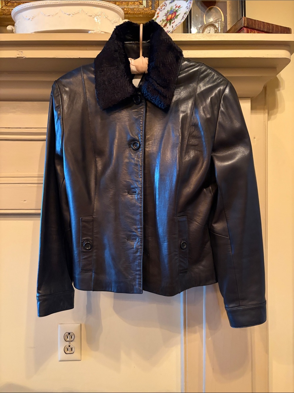 Black Leather Coat with detachable lambs wool collar.